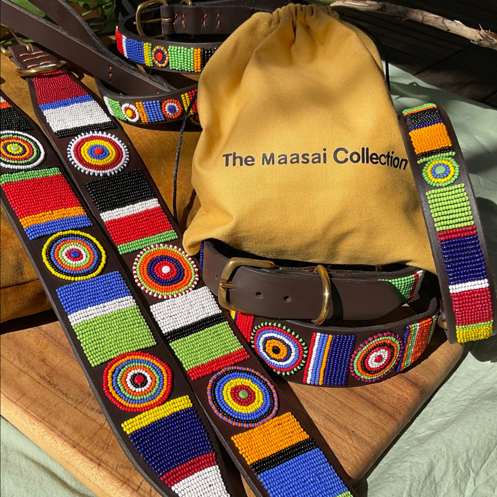 group photo of multiple different sizes and widths of multi-coloured handmade beaded leather collars from The Maasai Collection in the Sundance design