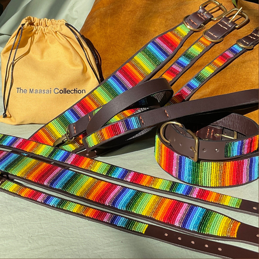 group photo of multiple different sizes and widths of rainbow design handmade beaded leather collars from The Maasai Collection 