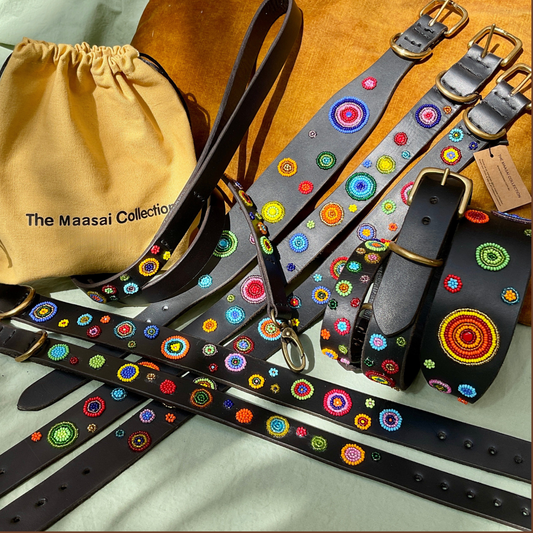 group photo of multiple different sizes and widths of multi-coloured handmade beaded leather dog collars in Solaris design from The Maasai Collection 